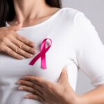 1920_stockphotoofapersonwearingabreastcancerribbon