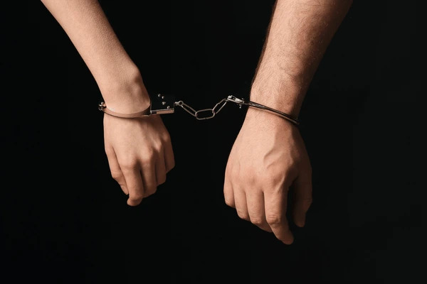 male-female-hands-handcuffs